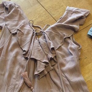 Pink ruffled, tasseled, pocketed jump suit